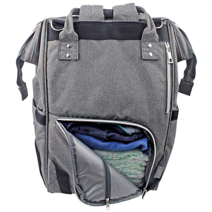 A rear view of a changing bag with the bottom zip pocket opened to show folded clothes and baby essentials neatly packed inside.