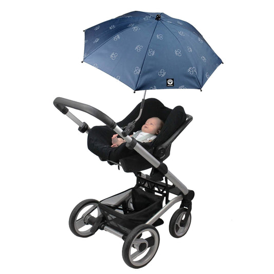 Dooky Blue Cherry parasol attached to a pushchair, shading a baby lying in a car seat facing upwards.