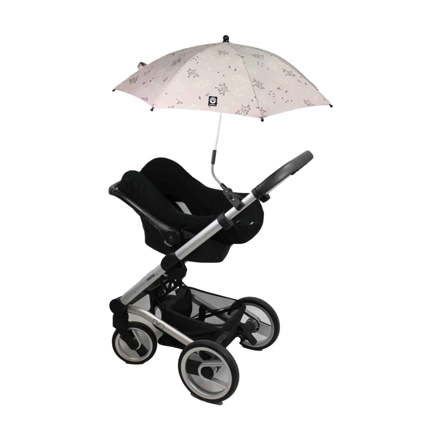 A beige parasol with a botanical print mounted on a stroller handle, fully opened above an empty rear-facing infant car seat.