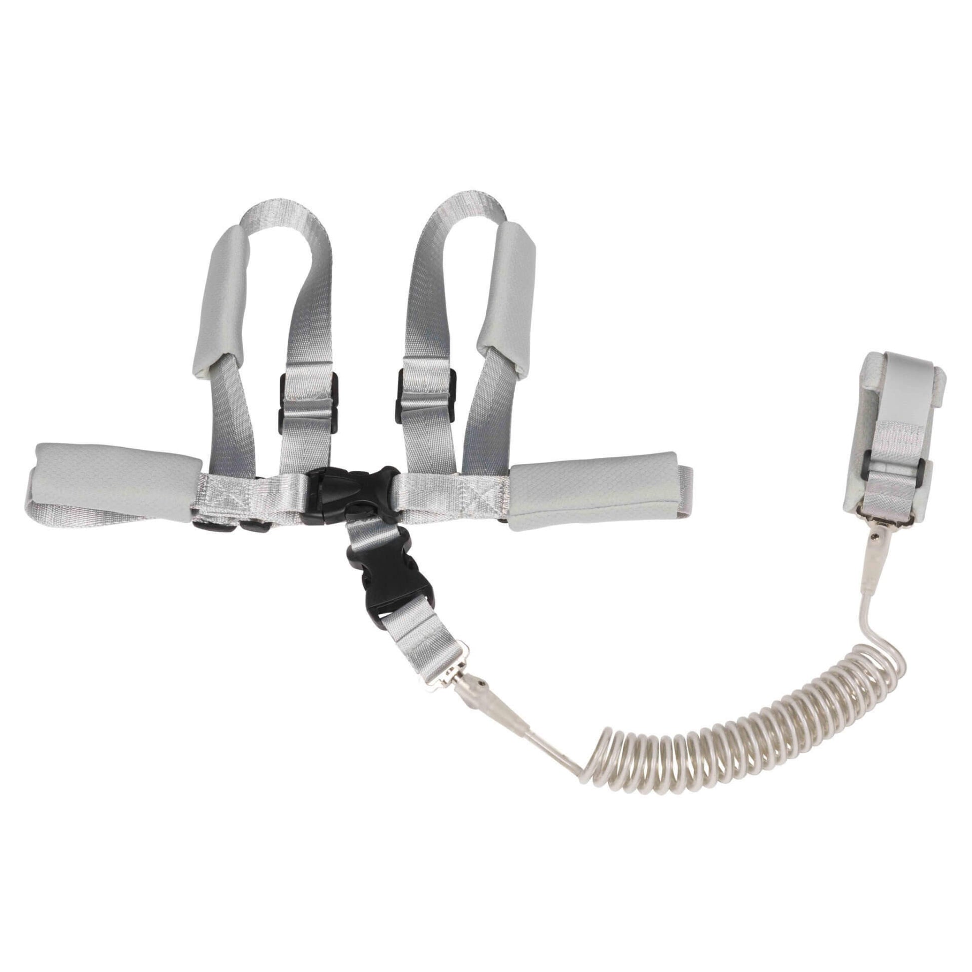 Adjustable padded child safety harness with shoulder and waist straps connected to a coiled tether and wristband.