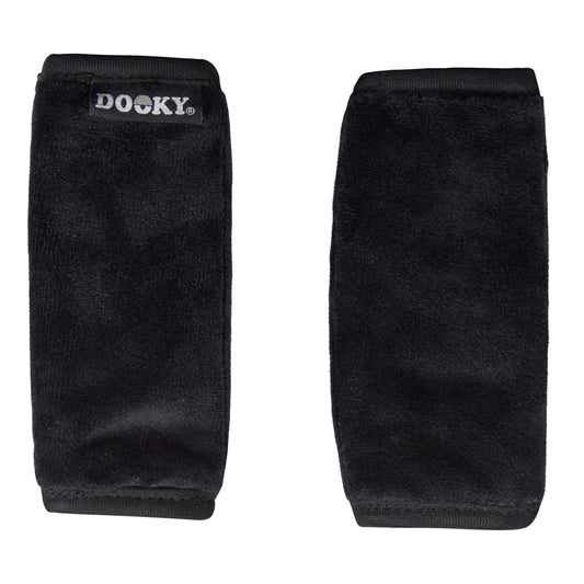 Dooky Seatbelt Pads in black providing soft, cushioned comfort for car journeys, designed to reduce irritation from seatbelt straps.