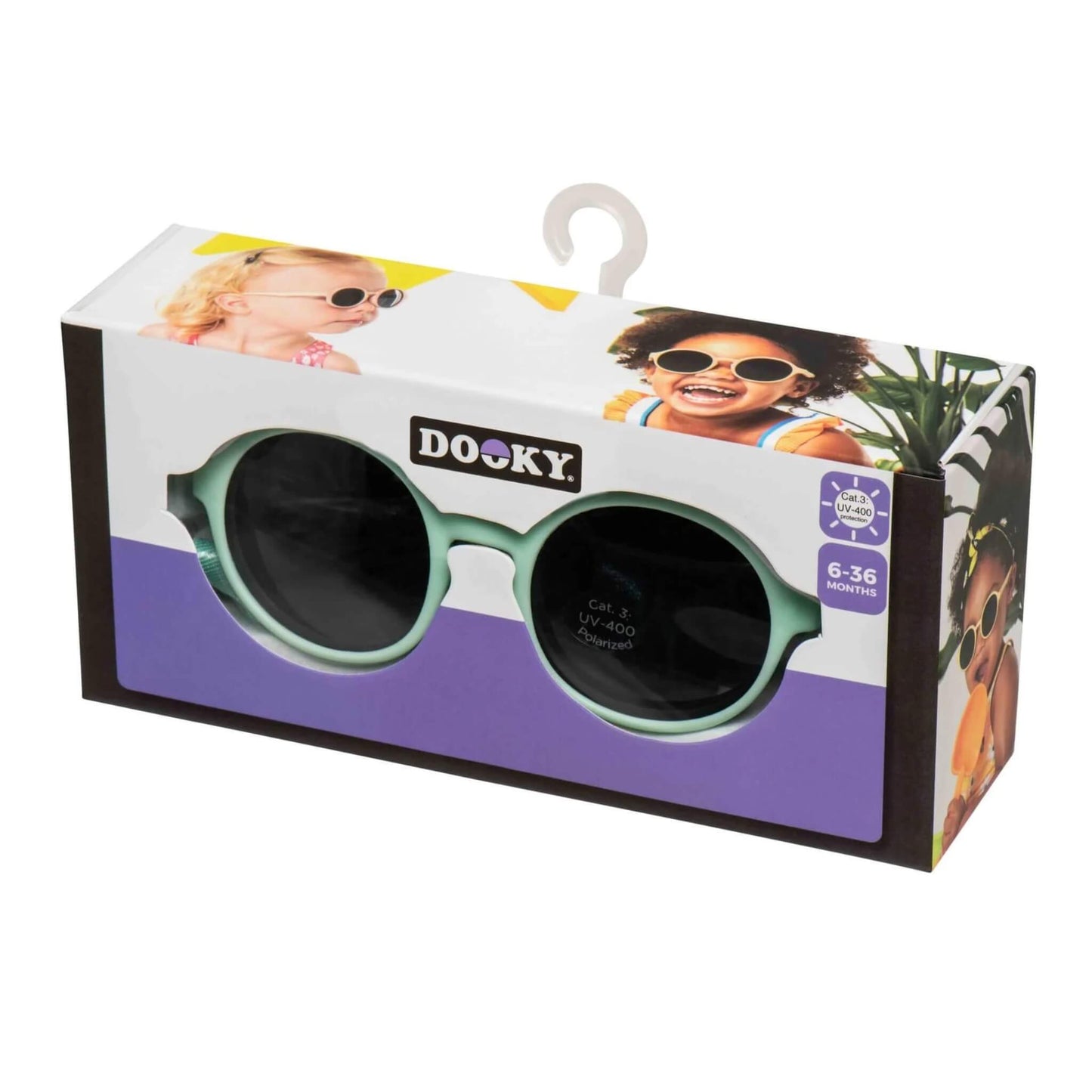 A boxed pair of mint baby sunglasses with UV-400 label visible, packaged in a colourful retail display with photos of young children wearing sunglasses.
