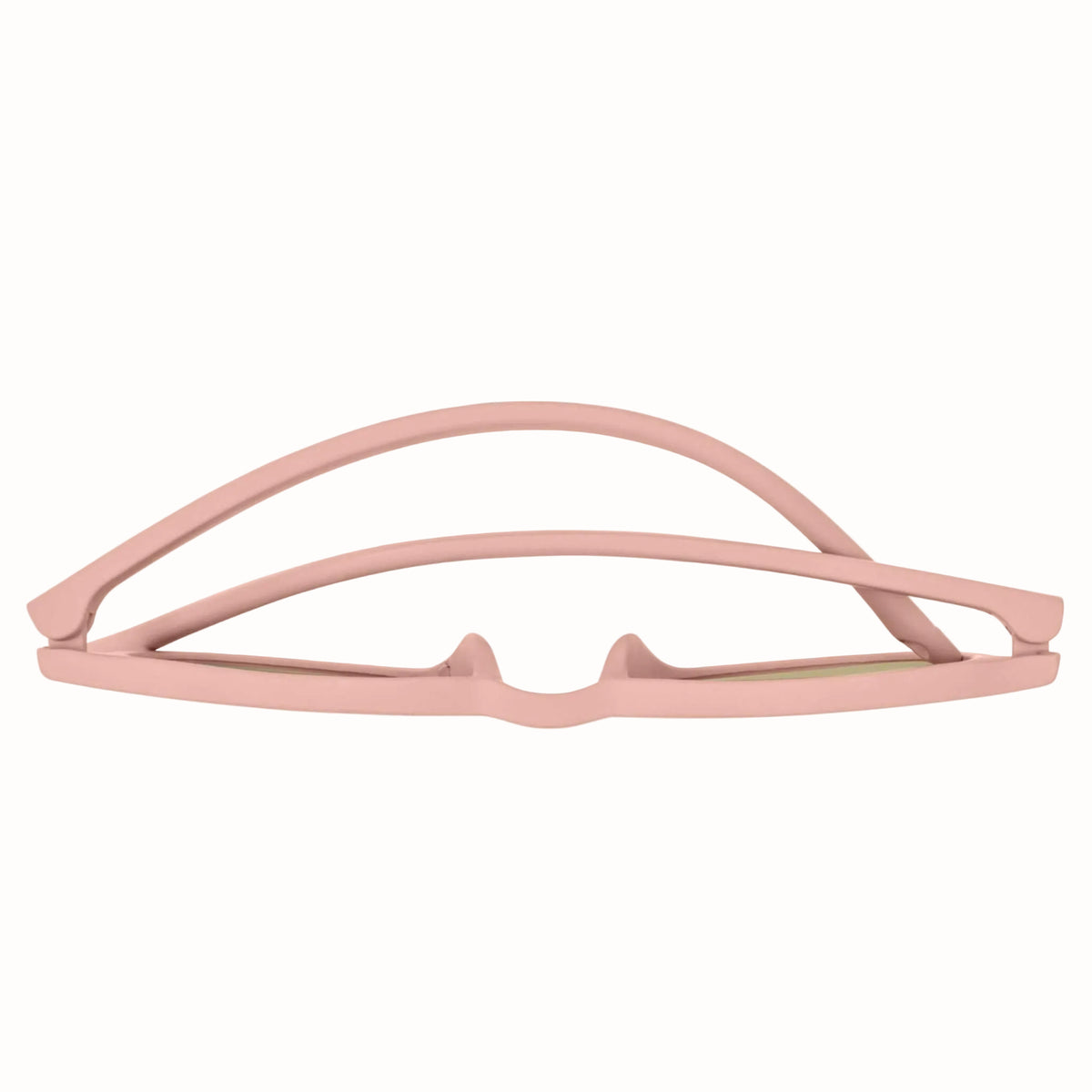 Pink baby sunglasses folded flat, showing the slim flexible frame.