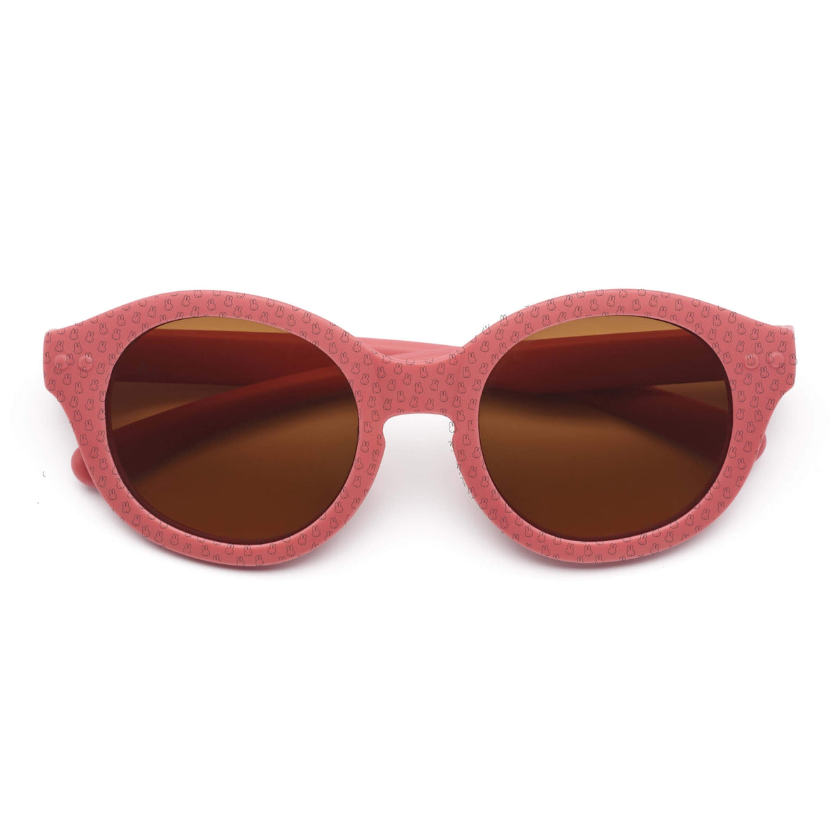 Dooky Miffy Sunglasses in Pink with rounded brown lenses and pink frames patterned with tiny Miffy characters.