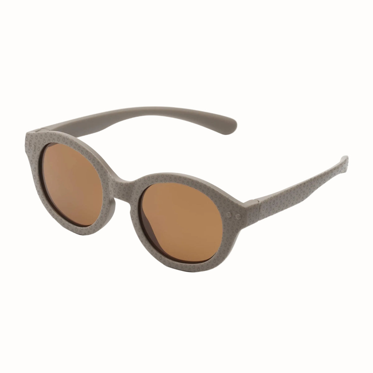 Taupe children's sunglasses with rounded brown lenses and a subtle all-over bunny pattern on the frames