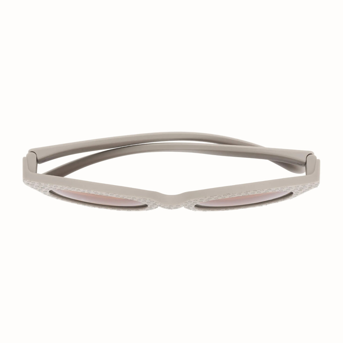 Top down view of kid's sunglasses showing the curved arms, hinges and rounded frames.