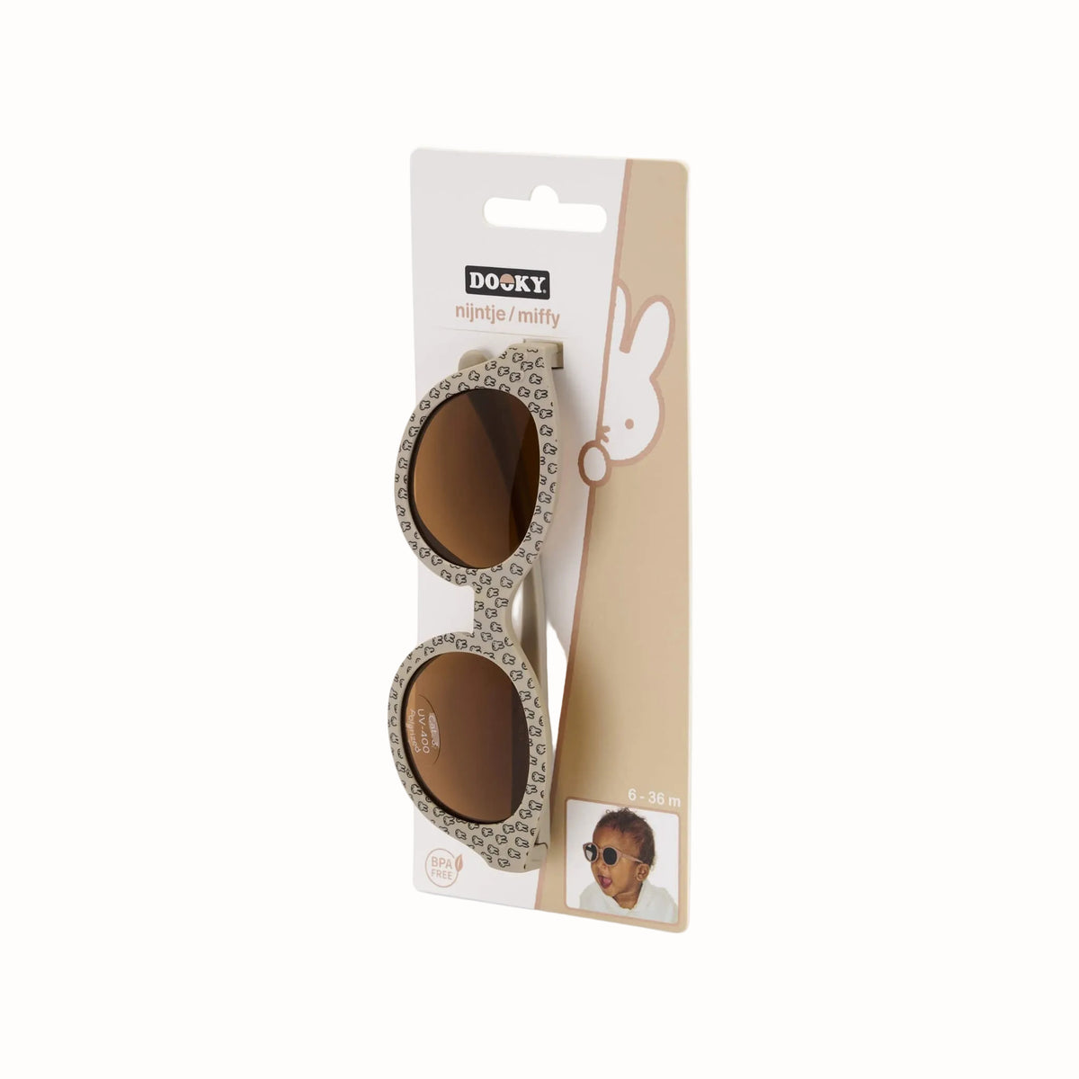 Taupe children's sunglasses displayed in Miffy packaging with brown lenses and patterned frames.