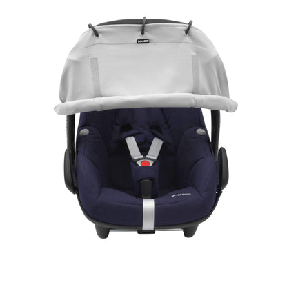 A grey sunshade attached to an infant car seat. The shade is rolled down and fixed with Velcro, covering the upper portion of the seat.