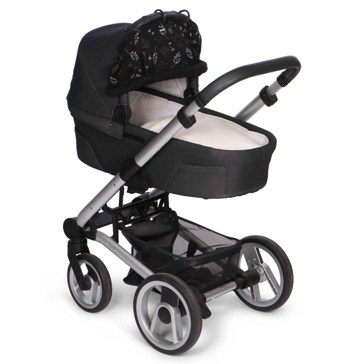 A black pram with a carrycot covered by a softly draped black sunshade in a leaf pattern, secured with rings across the front edge of the hood.