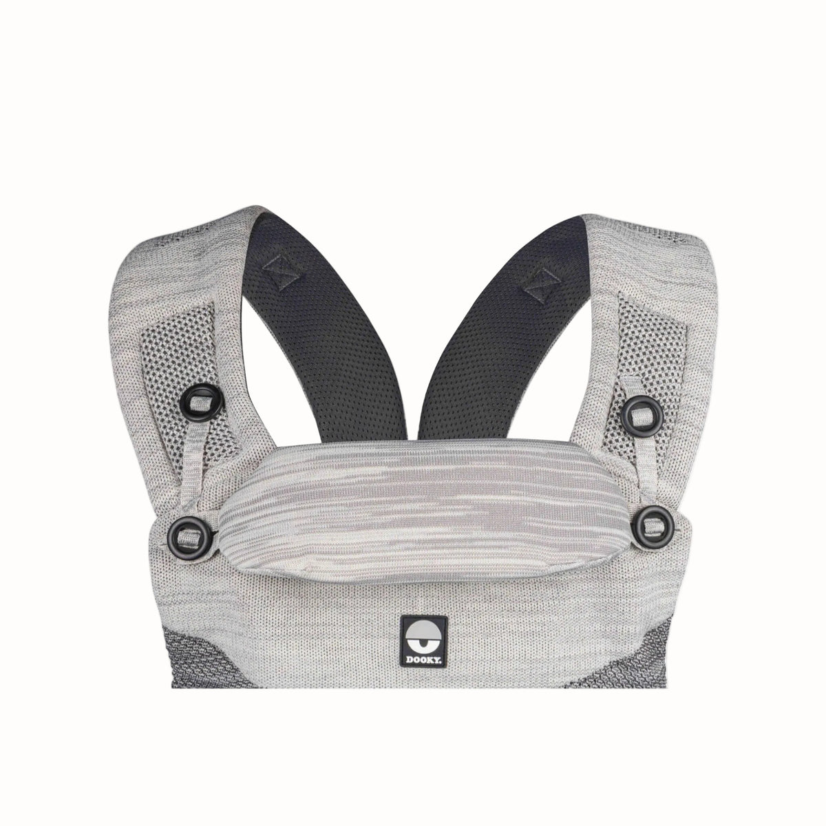 Close-up of a grey baby carrier showing the padded head support, shoulder straps and adjustable fastenings.