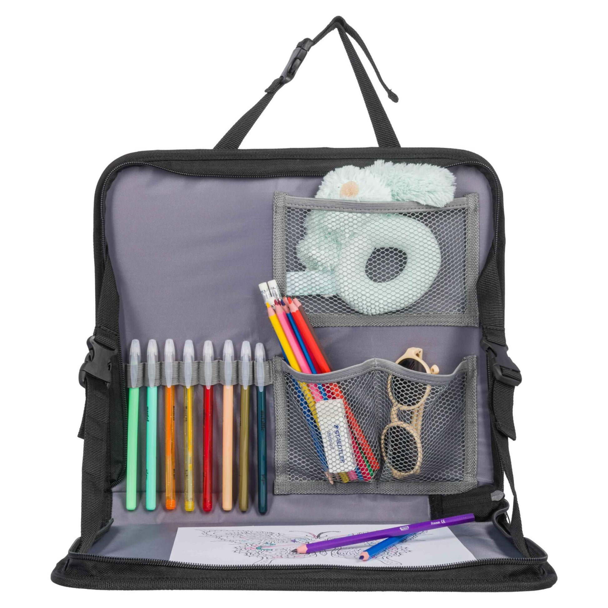 A fully stocked open travel tray showing markers, pencils, soft toys and sunglasses in mesh pockets, with a colouring page placed on the tray surface.
