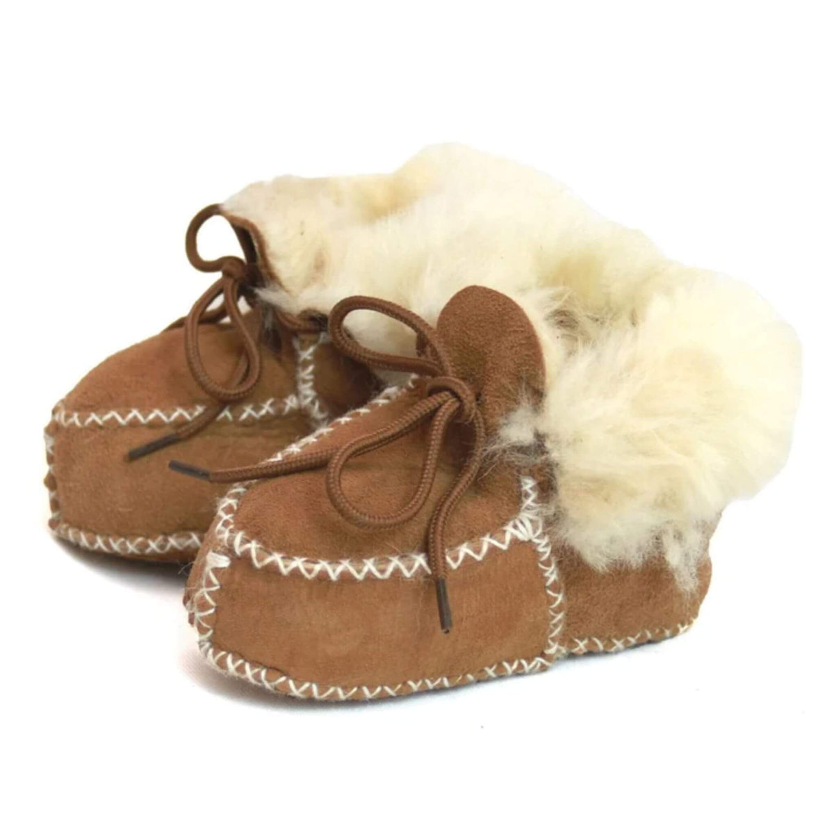 Pair of brown baby boots with sheepskin fur lining on a white background.