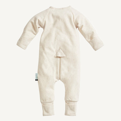 Back view of a soft oatmeal cotton babygrow with long sleeves, fold-over cuffs, and concealed zip for easy nappy changes