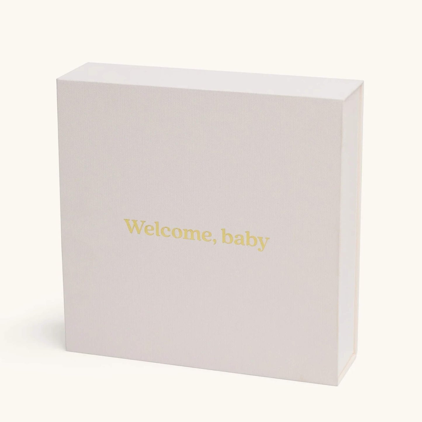 The back of the keepsake gift box with the phrase “Welcome, baby” printed in soft yellow text.