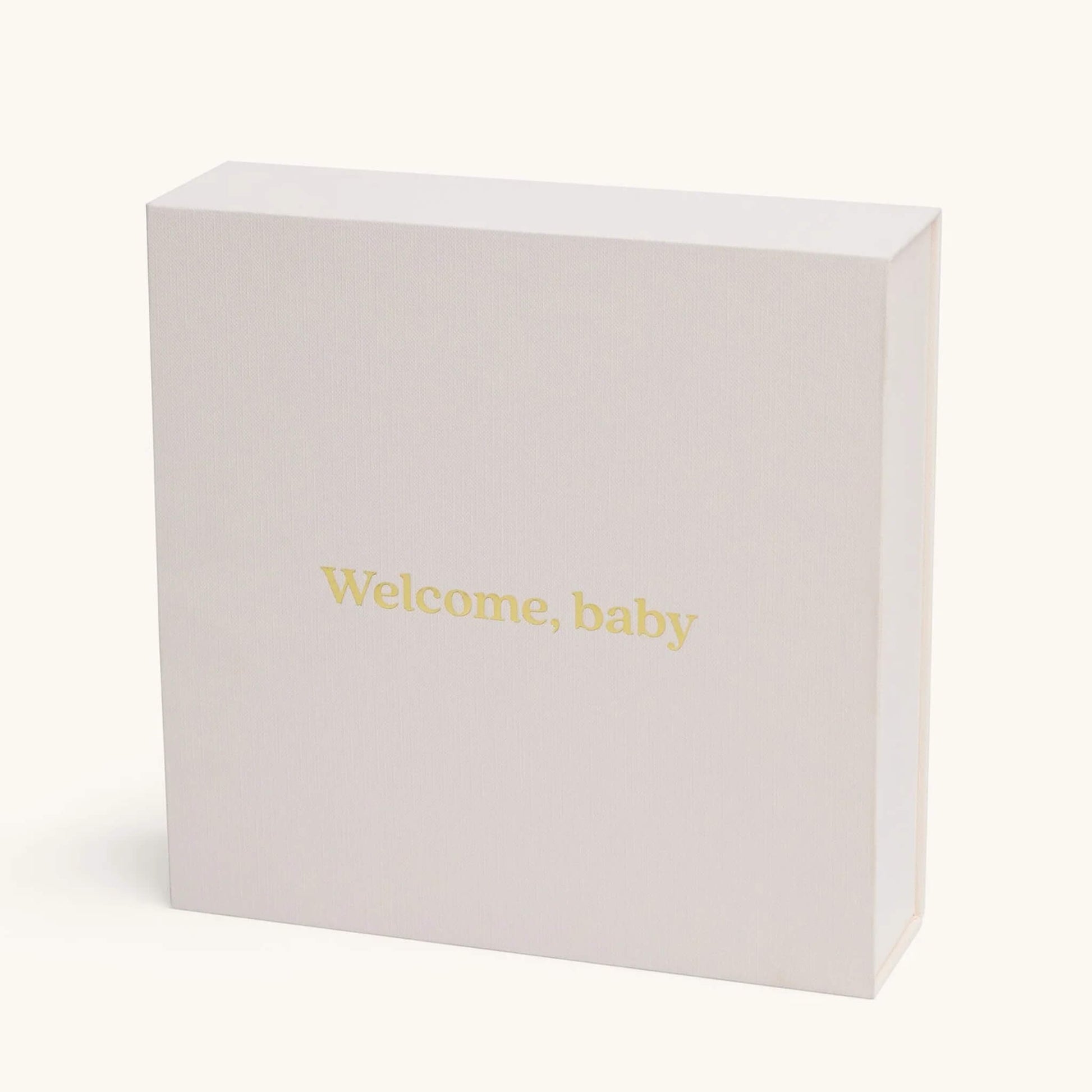 The back of the keepsake gift box with the phrase “Welcome, baby” printed in soft yellow text.