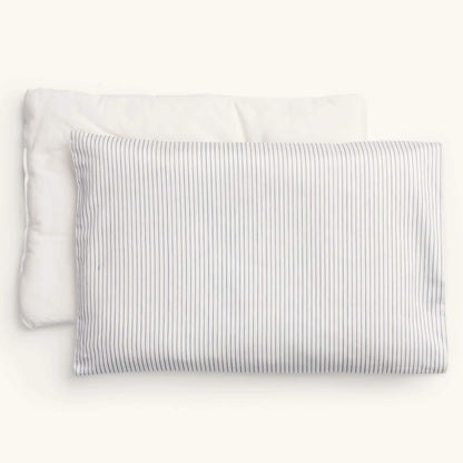ErgoPouch Organic Toddler Pillow and Case in the Midnight Stripe print, featuring a white pillow with thin navy vertical stripes, displayed with its insert.
