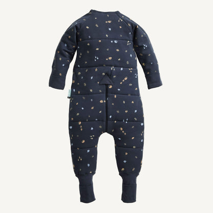 Back view of a Sleep Onesie in Hedgehog print showcases its practical design with a secure fit and nature-inspired pattern. Featuring woodland elements like hedgehogs, acorns, and leaves.