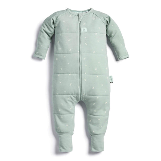A sage green ErgoPouch Sleep Onesie featuring a cosy quilted design with delicate white patterns, long sleeves, and foot cuffs.