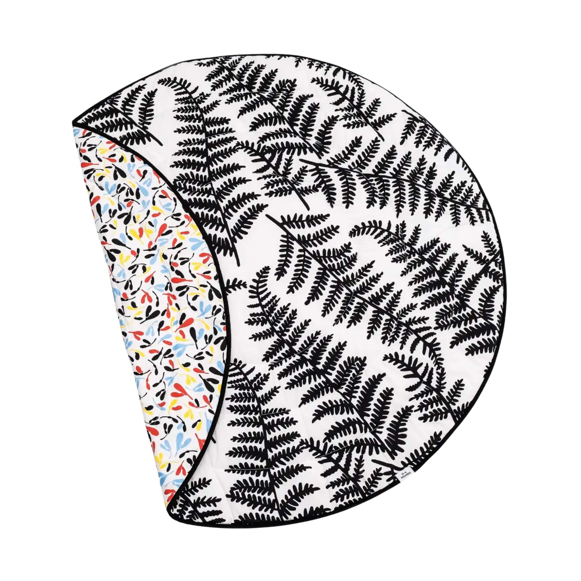 Etta Loves Sensory Baby Playmat in Plant Print, reversible padded organic cotton mat shown folded back to reveal bold black botanical pattern and colourful developmental print.
