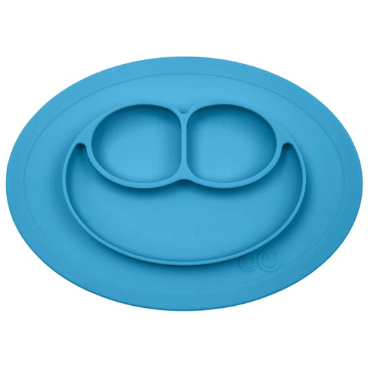 Blue Ezpz Mini Mat silicone suction placemat and baby plate. Three infant-sized sections in a smile layout, shown empty on white background.