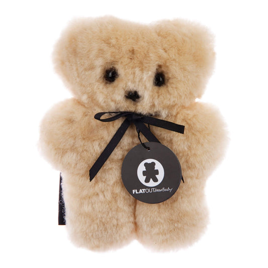 Soft, cuddly and flat, the FLATOUT Bear is made from 100% Australian sheepskin shaped like a teddy bear. 