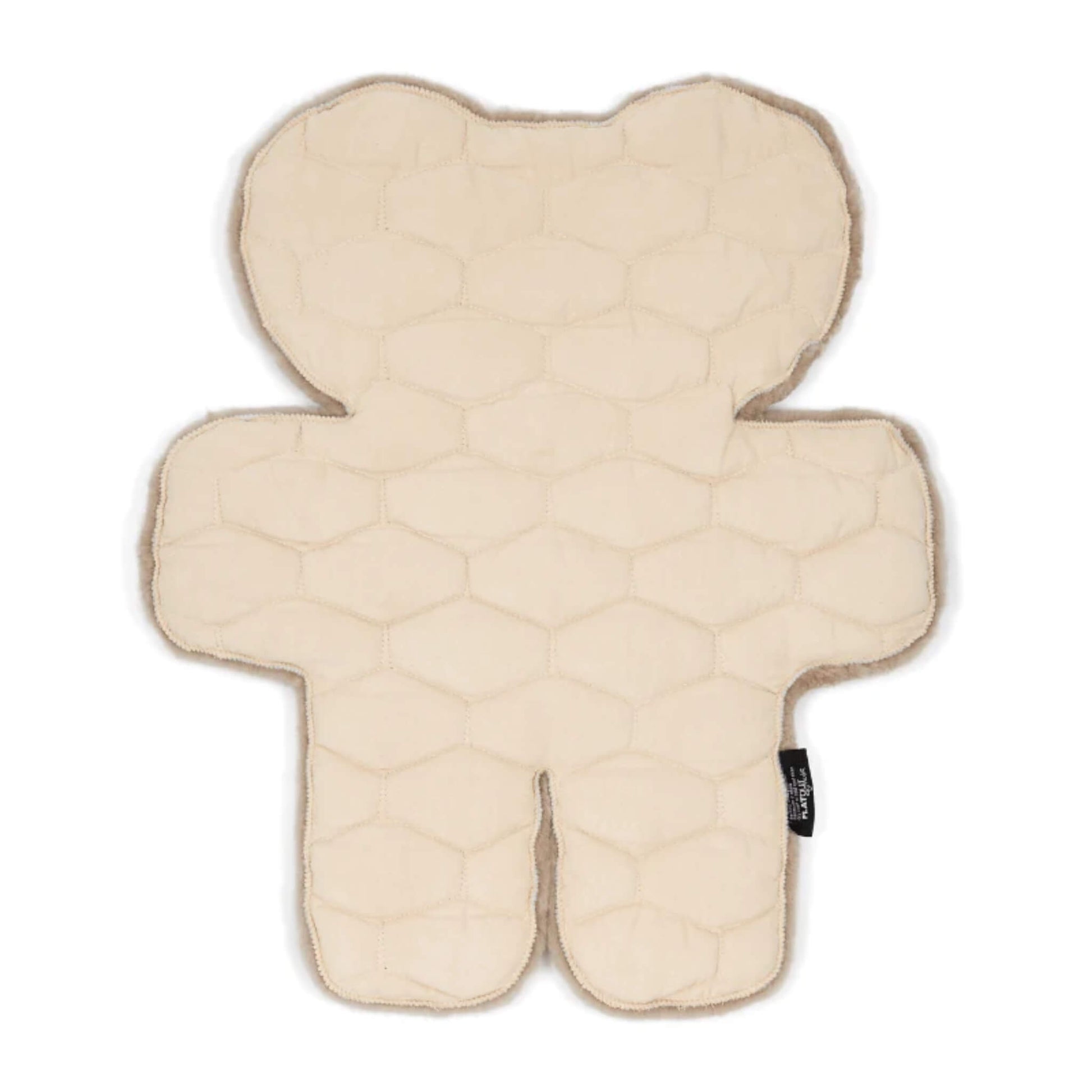 A bear-shaped baby play rug shown from the reverse, featuring a padded backing with stitched hexagonal quilting in a light neutral fabric.