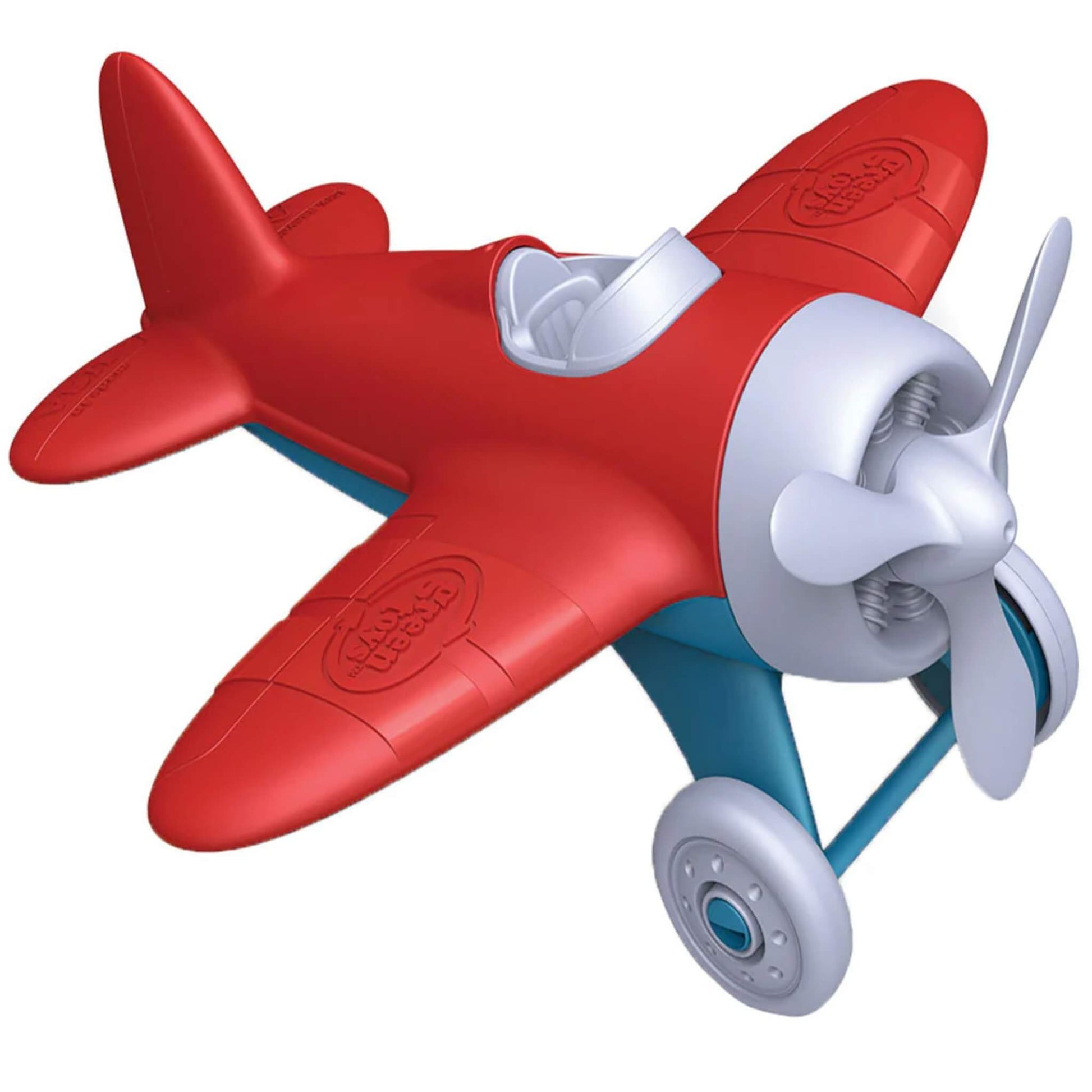 Green Toys Airplane with red wings and blue undercarriage, shown at an angle to highlight the spinning propeller, open cockpit and rounded wing design.