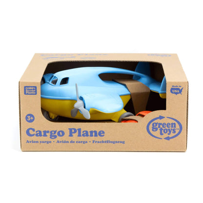 Green Toys Cargo Plane shown in its retail packaging with the mini car partially visible in the box.