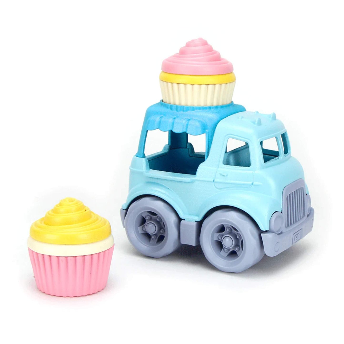 Green Toys Cupcake Truck with one cupcake on top and another beside it, featuring soft pastel colours and chunky wheels.