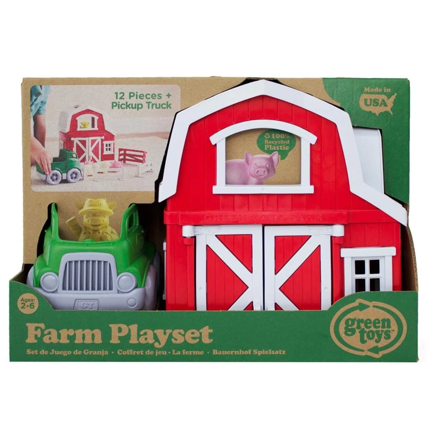 Retail packaging of the farm set showing the assembled barn and pickup truck, with a visible pig in the window and text noting "12 pieces + pickup truck."