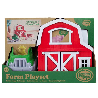 Retail packaging of the farm set showing the assembled barn and pickup truck, with a visible pig in the window and text noting "12 pieces + pickup truck."