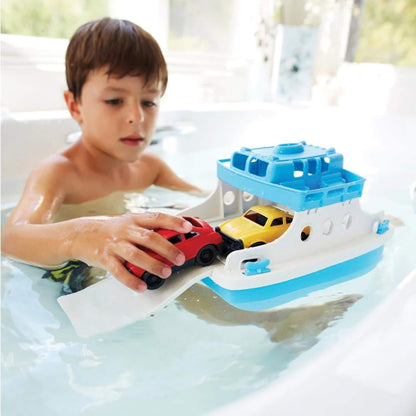 Young child playing with the Ferry Boat in the bath, guiding the mini cars onto the ramp for realistic, water-based roleplay.
