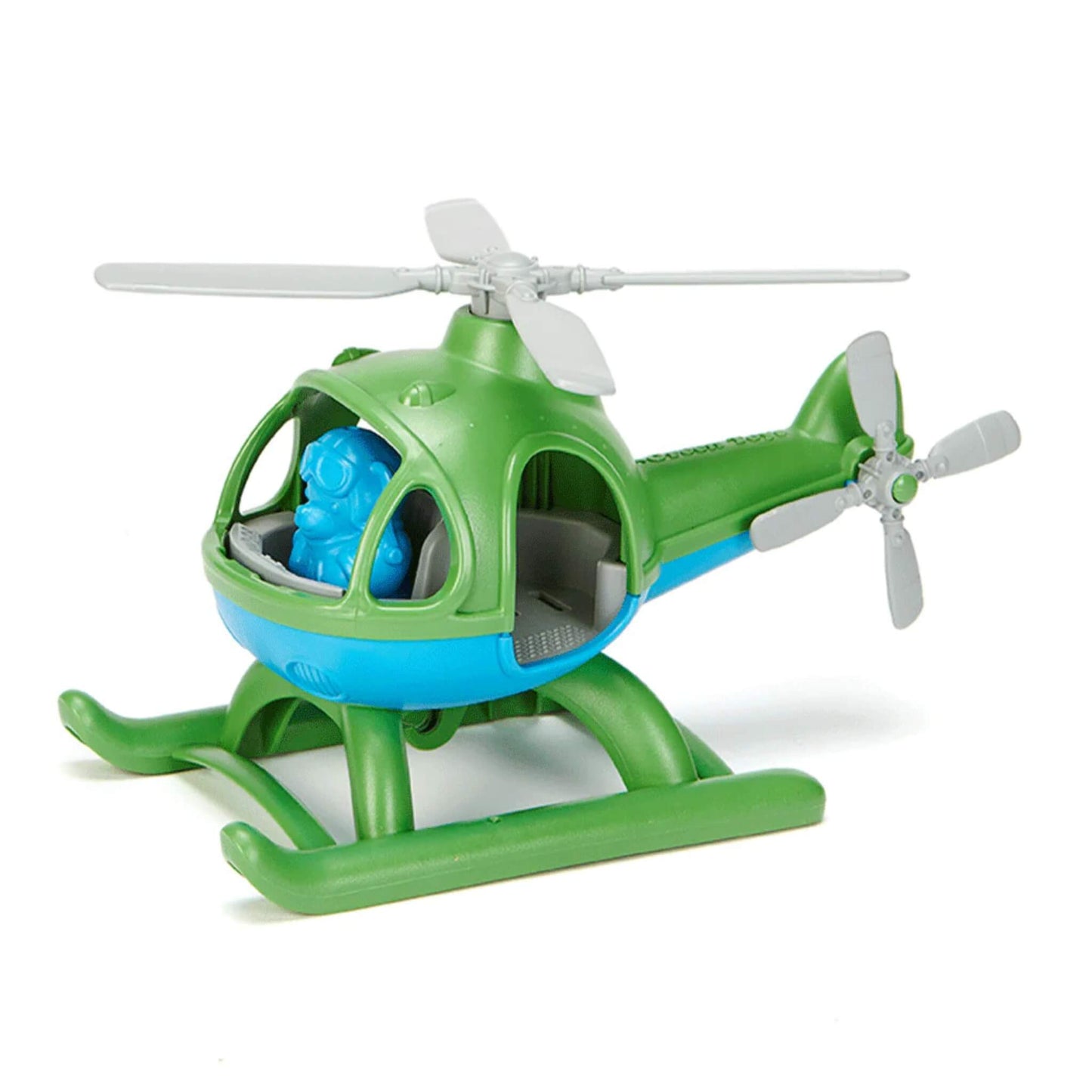 Green Toys Helicopter in green and blue with grey rotors and a blue bear pilot figure seated inside the cockpit, shown from a side-front angle.
