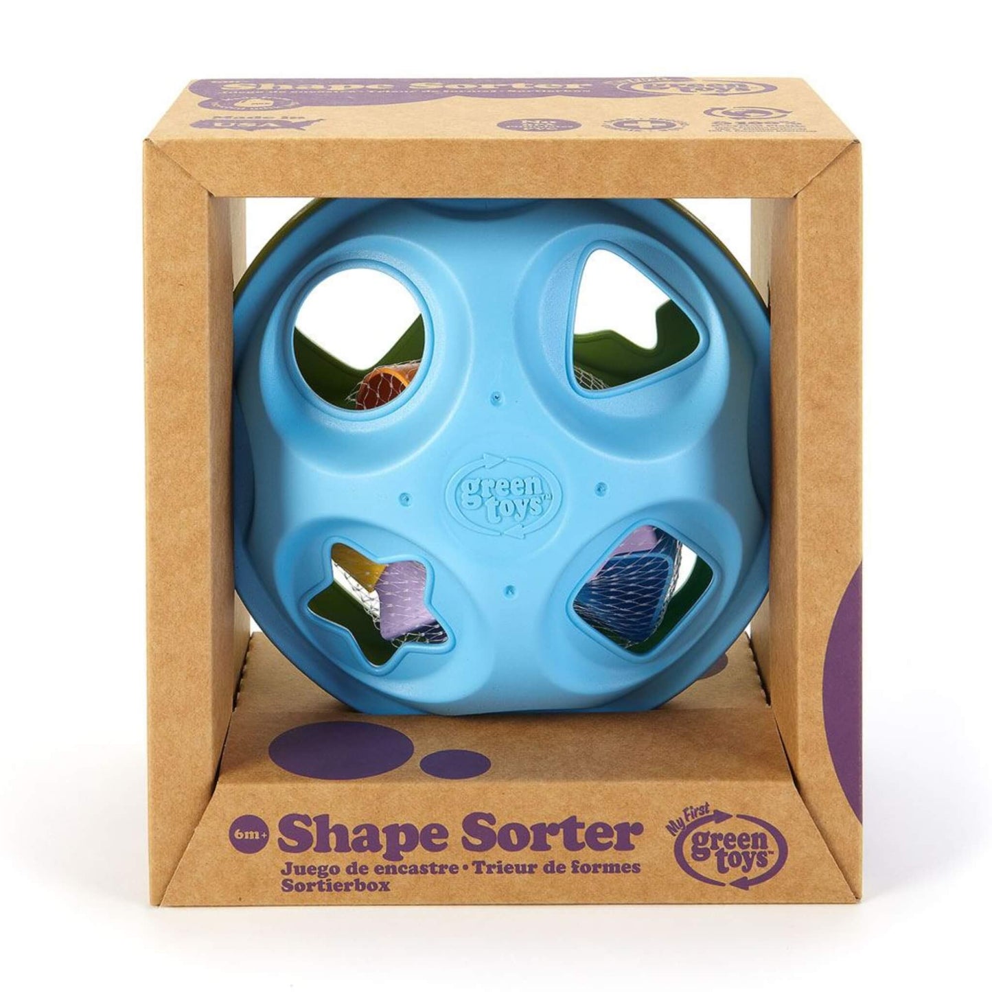 Shape sorter toy shown packaged in its recyclable cardboard box with the shapes visible through the cut-outs in the sorter body.