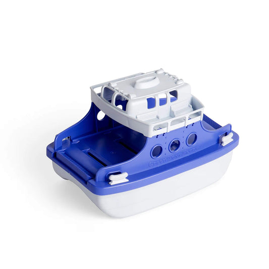 Green Toys OceanBound Ferry Boat shown from the front-left with upper deck detail and closed loading ramp, featuring a blue and white eco-friendly plastic design made from OceanBound materials.