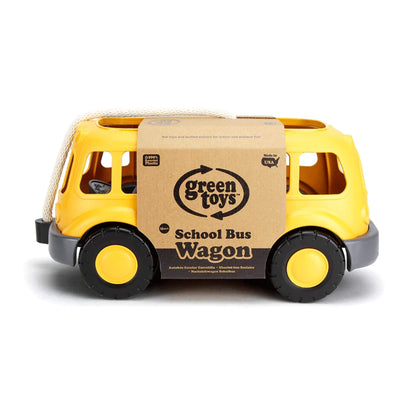 Straight side view of the packaged school bus wagon, highlighting the product name, branding, and textured plastic wheels.