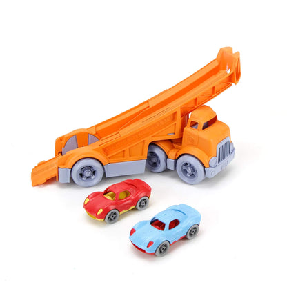 Orange Green Toys Racing Truck with built-in ramp shown alongside red and blue race cars, displayed on a white background.