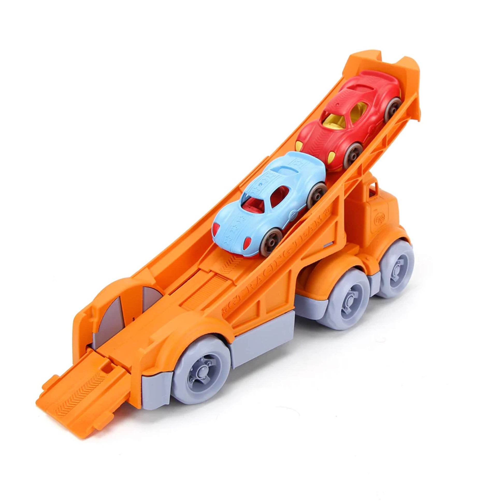 Top-down angle of the Green Toys Racing Truck, featuring the built-in ramp and two race cars lined up for a roll-down.
