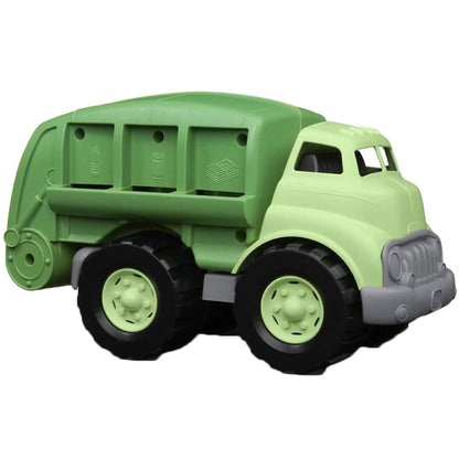Green Toys Recycling Truck in two-tone green with black wheels, featuring three moulded sorting slots for bottles, cans and paper, shown on a white background.