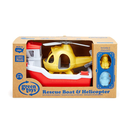 Retail packaging of the Green Toys Rescue Boat & Helicopter, with the toy clearly visible inside the box and two figures shown in a side display window.
