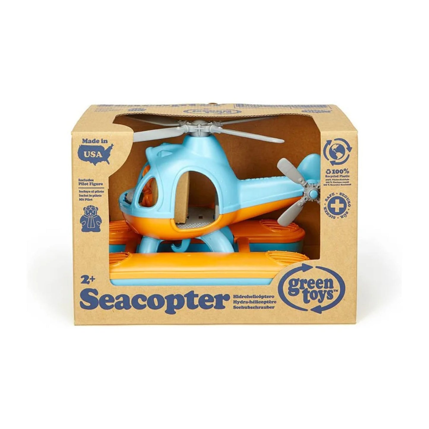 Green Toys Seacopter packaged in its original box, showing the toy clearly with details including age suitability, recycling info, and pilot figure included.