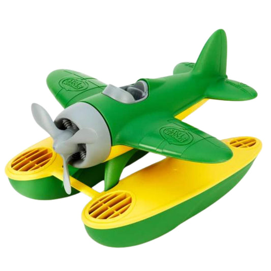 Green Toys Seaplane with green wings and yellow pontoons shown angled to the side, featuring a spinning grey propeller and embossed branding on the wings.