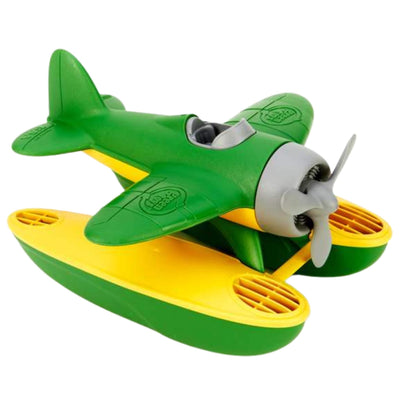 Overhead view of the Green Toys Seaplane highlighting the green wings, yellow pontoons and visible cockpit area.