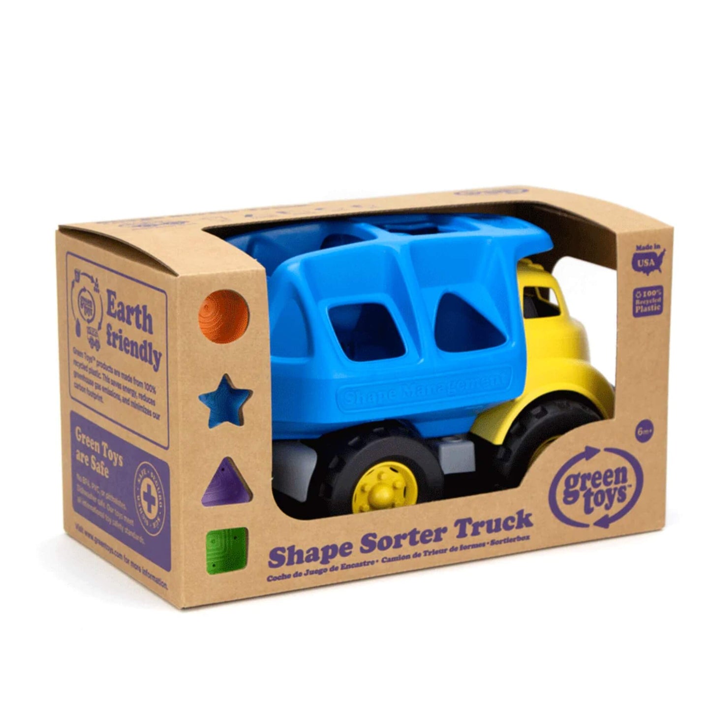 Shape sorter truck in fully enclosed recycled card packaging with cut-out windows showing shapes and eco-friendly messages.