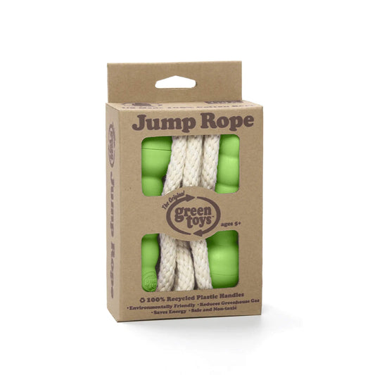 Product in retail packaging showing the Green Toys Skipping Rope through cut-out windows in a recycled cardboard box, with eco-friendly features listed on the front.