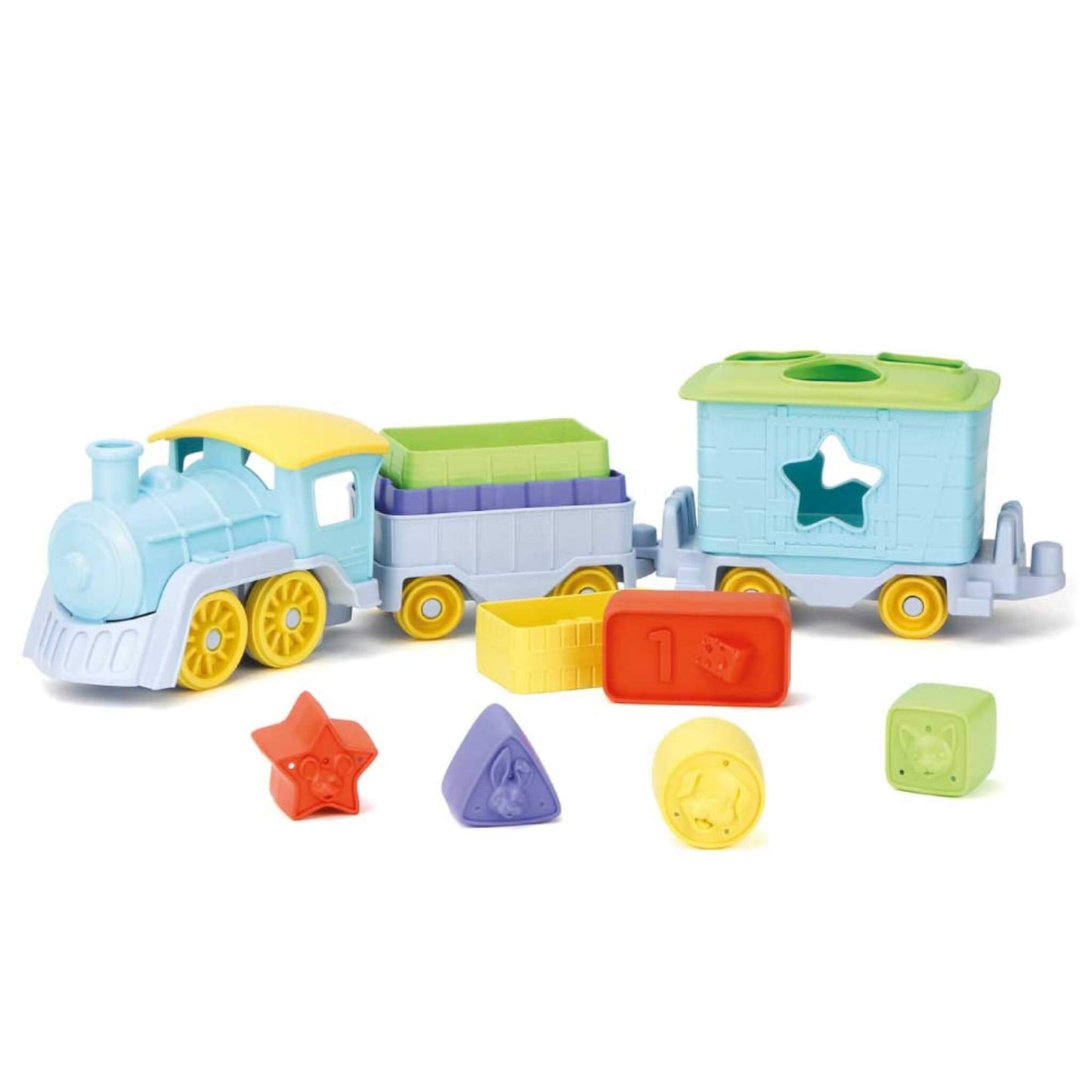 Green Toys Stack & Sort Train Set shown with pastel blue engine, two carriages, colourful stacking blocks and shape pieces arranged in front.