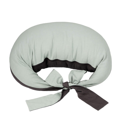 Hippychick Feeding Pillow in Charcoal and Sage Green shown in a crescent shape with wide fabric ties, designed to support breastfeeding and bottle feeding.