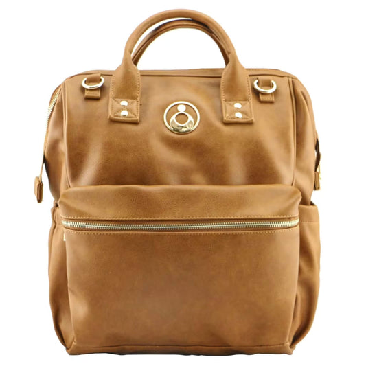 Isoki Byron Backpack Changing Bag in Amber showing structured design in tan vegan leather with gold hardware and front zip pocket.