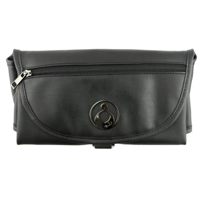 Isoki Change Mat Clutch in Onyx Black, folded neatly with zip pocket and metal brand plate visible on the front.