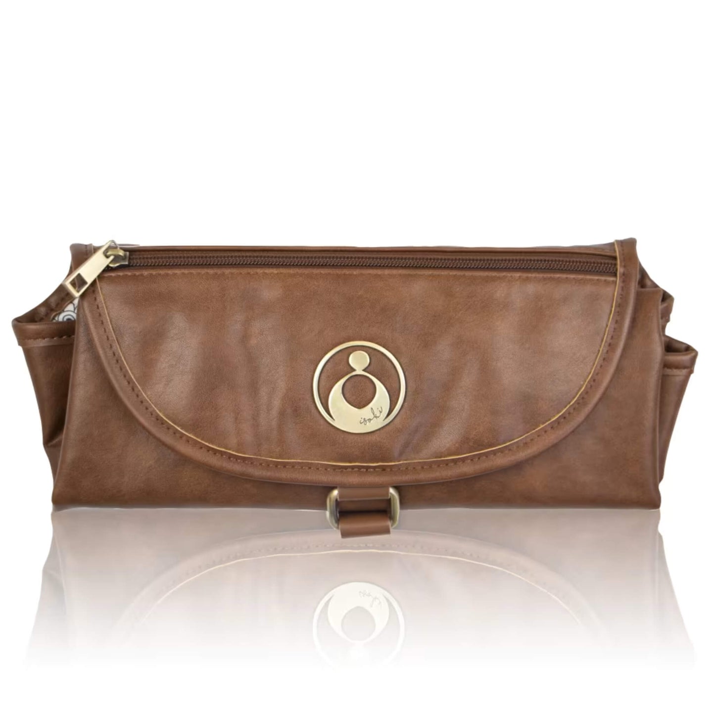 Isoki Change Mat Clutch in redwood chestnut, folded neatly with gold zip and circular brand emblem on the front flap.